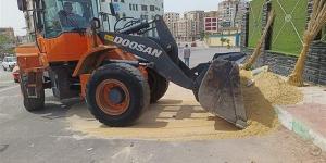 حملة لإزالة الإشغالات والتعديات على حرم الطريق بحي ثالث بالإسماعيلية - مصر النهاردة