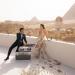بحضور زاهي حواس، ملياردير هندي يحتفل بزفافه على عارضة أزياء في الأهرامات (فيديو وصور) - مصر النهاردة