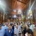 "سعف النخيل وأجواء مبهجة"، أقباط بورسعيد يؤدون القداس الإلهي بالكنائس (صور) - مصر النهاردة