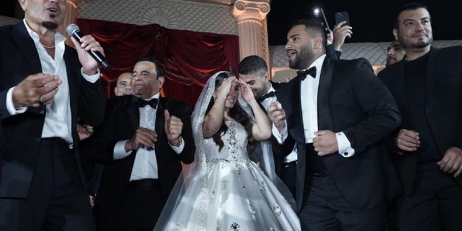 فستان زفاف عروسة نجل محمد فؤاد حديث السوشيال ميديا| سعره المتوقع - مصر النهاردة